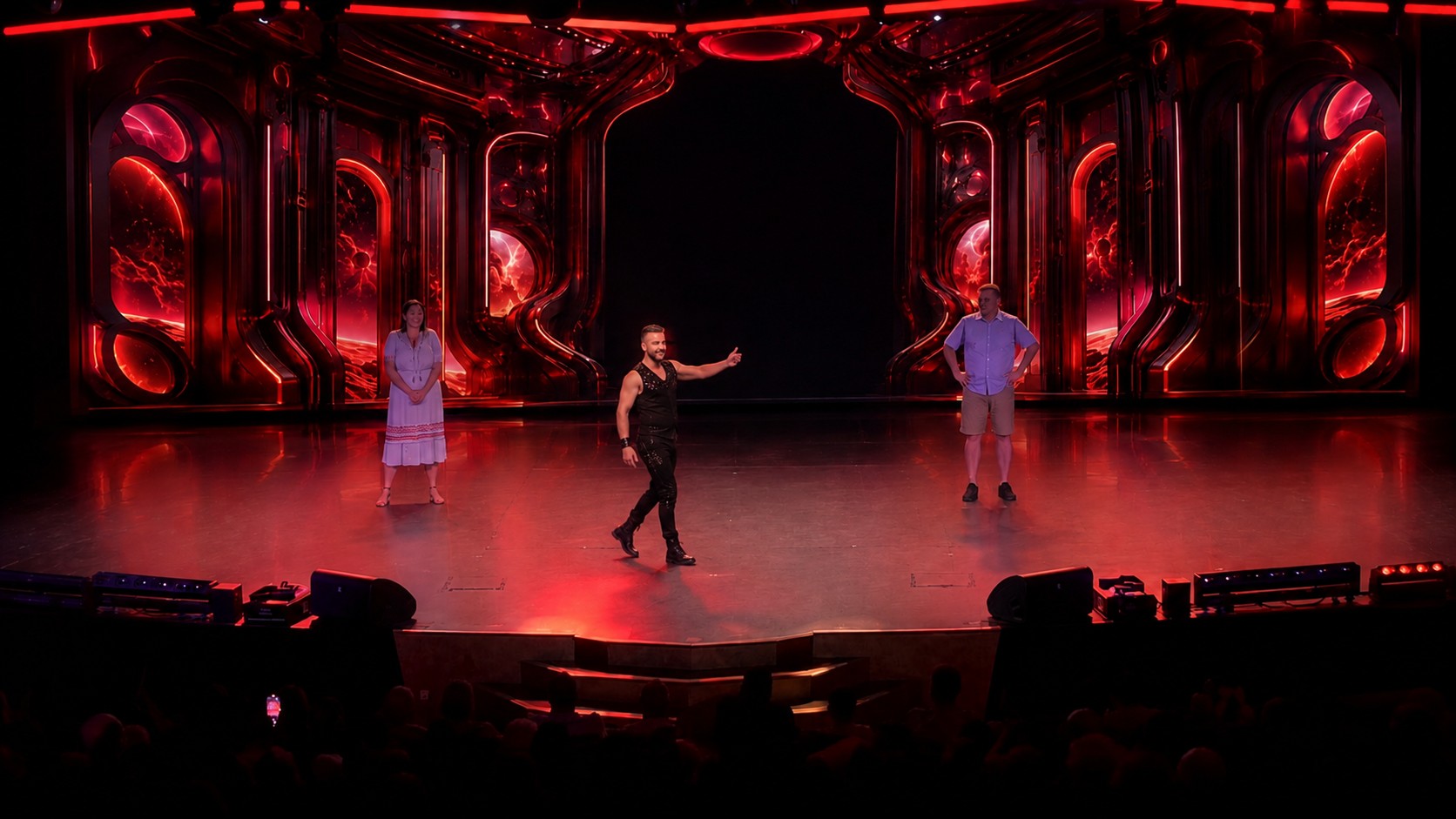 Magical Multiverse — audience moment under red stage light