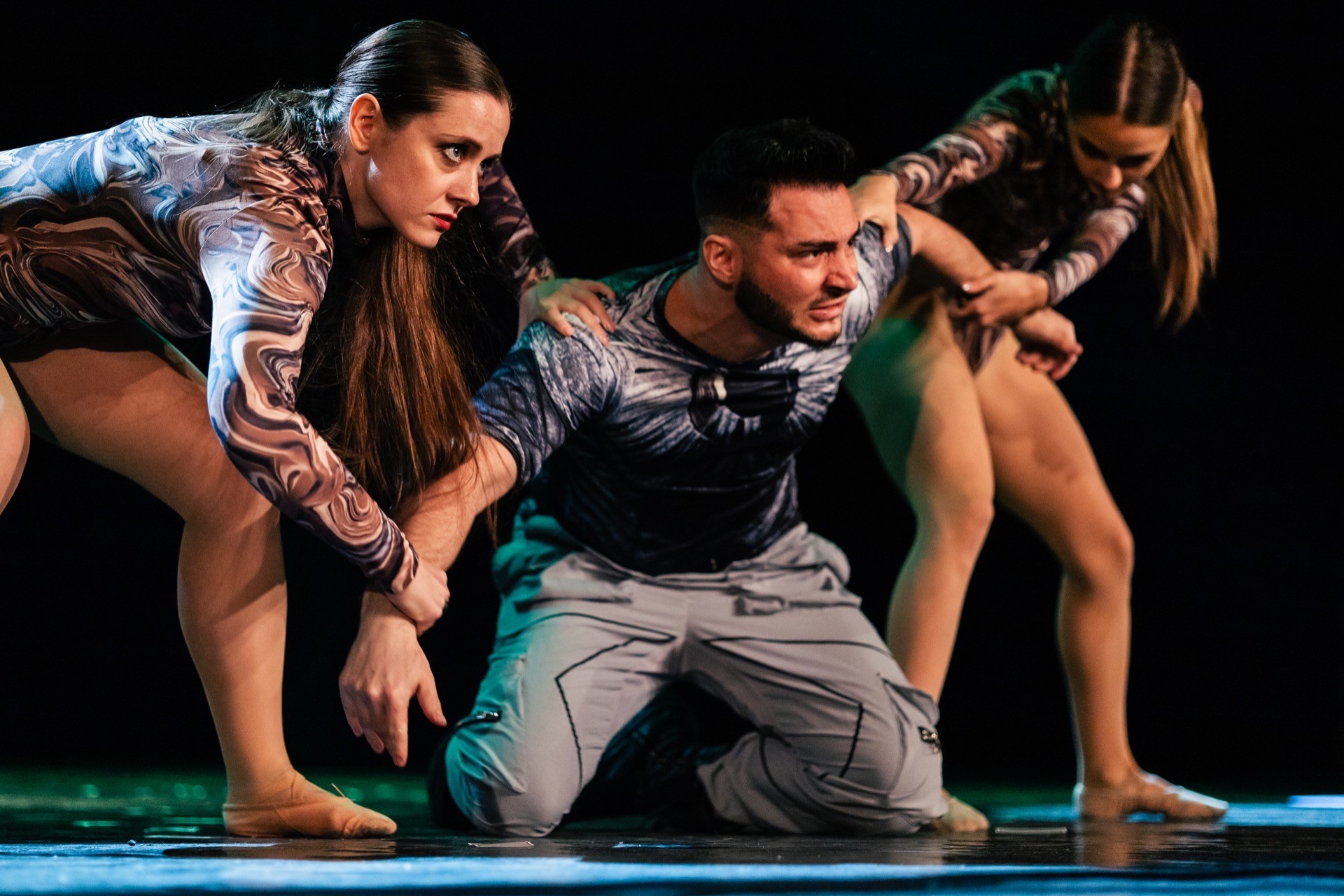 Magical Multiverse — dramatic stage moment with dancers