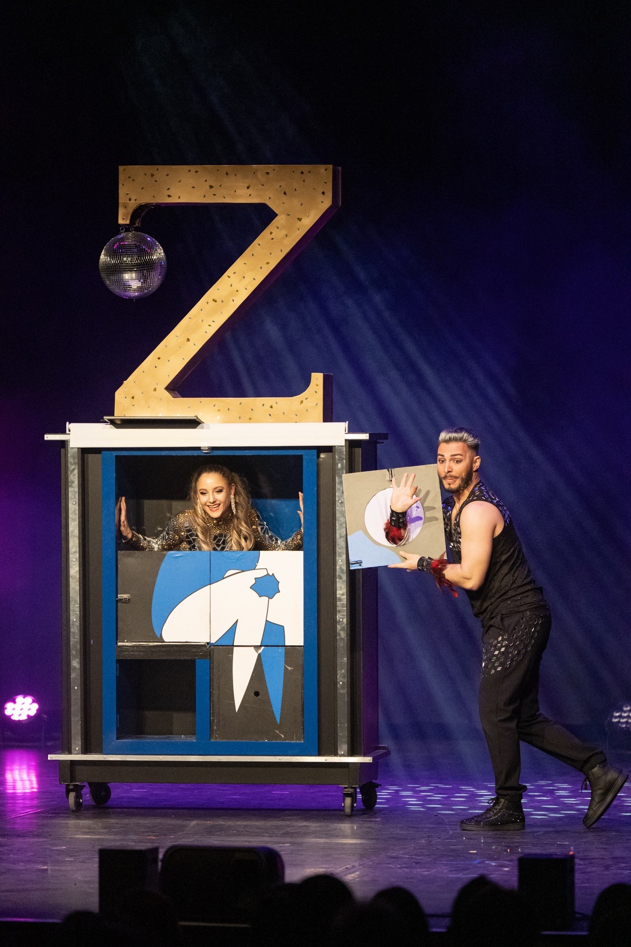 Zee Zeus — cabinet illusion with assistant